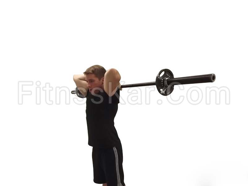 پشت بازو بالای سر هالتر ایستاده - تصویر 1